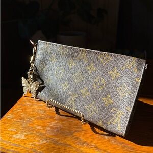 Louis Vuitton Monogram Canvas Wristlet Clutch in Brown and Gold